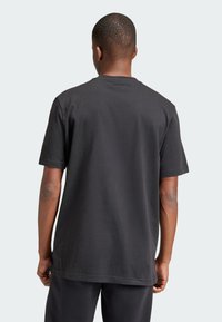 adidas Originals FLAMES LOGO  - T-shirts print - black