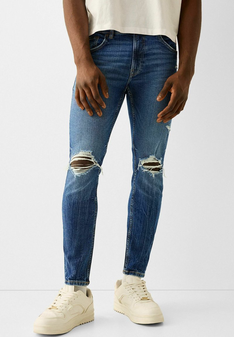 Jean Bershka Slim Court, Taille 34, Neuf Avec étiquettes, Coupe Courte, Délavé Bleu, Matière Coton