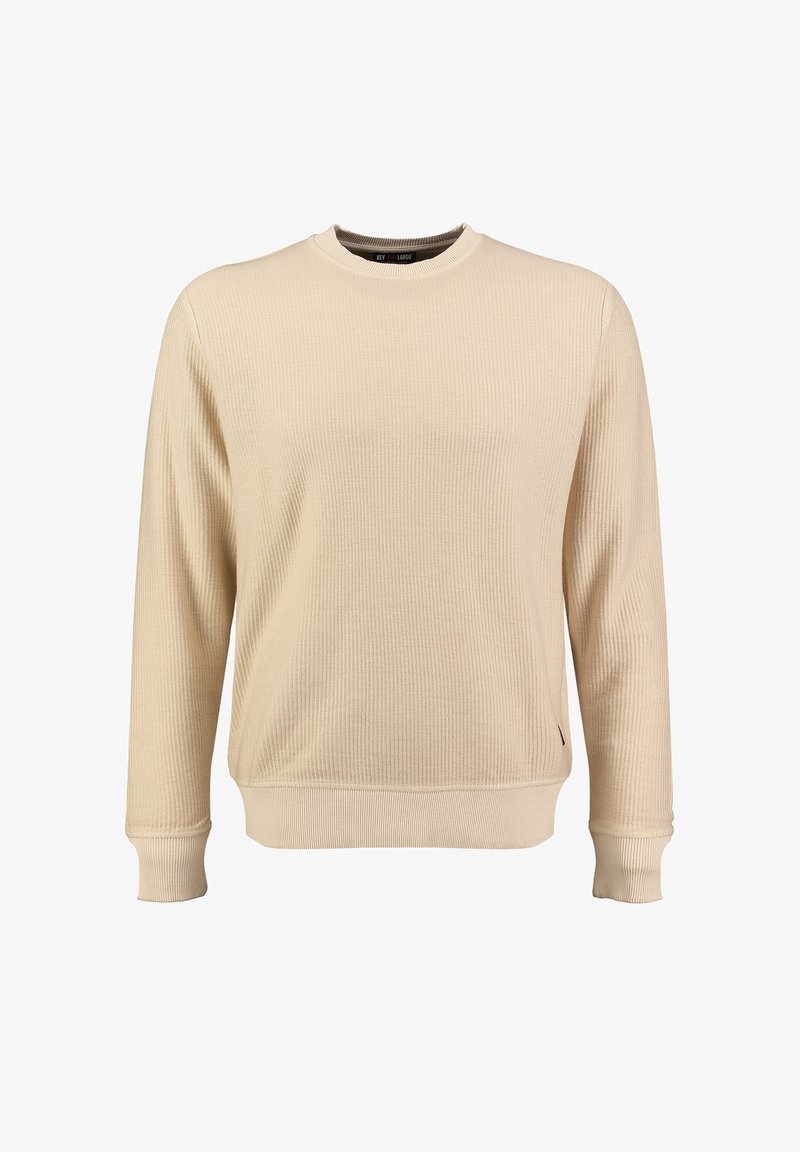 Felpa ribbed beige con collo rotondo, maniche lunghe e orlo inferiore aderente. Presenta un piccolo tag logo laterale. Tessuto liscio.