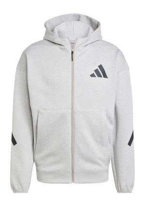 Lichtgrijze hoodie met rits, capuchon, voorzakken en zwart Adidas-logo op de borst en mouwen.