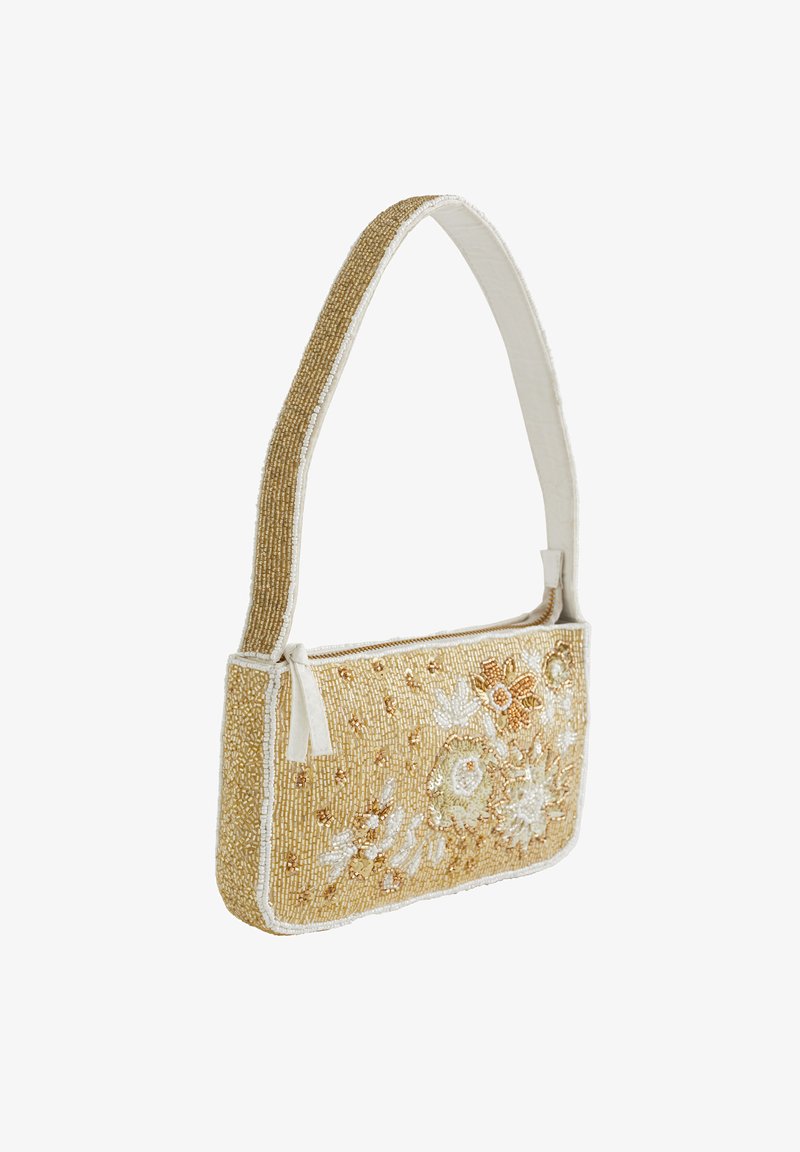 Beaded torbica v zlati barvi z rožnatim vezenjem. Ima kremasto naramnico in dekorativen resasti dodatek. Pravokotna oblika z zadrgo.