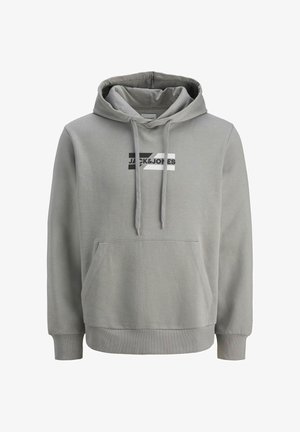 Sivih bombažna kapuca z vrvicami, kengurujskim žepom in črno-belimi logotipnimi oblikami spredaj. Ima rebraste manšete in spodnji del.