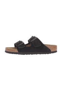 Sorte ruskind slidesandal med to justerbare stropper, korkmellemsål og struktureret gummiindersål, der har et fladt, åbent design.