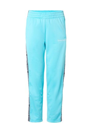 Hellblaue Jogginghose mit elastischem Bund, Seitentaschen und schwarzen Seitenstreifen mit weißem "bruno banani" Schriftzug.