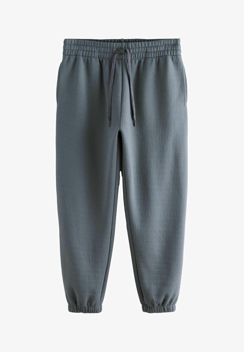 Pantaloni jogger gri, texturat, cu talie elastică, detalii cu șnur și manșete tapered. Potriviți pentru ținute casuale și confort.