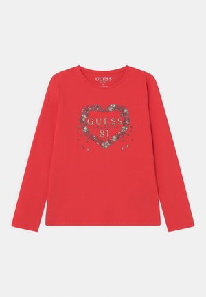 Rotes Langarmshirt mit floralem Herzdesign und silbernem Schriftzug „GUESS LOS ANGELES 81“ auf der Brust, Größe 10.