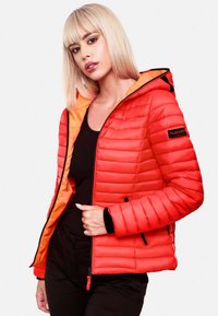 Red puffer jacket with orange lining, quilted design, zipper closure, and black accents, featuring a hood and side pockets.