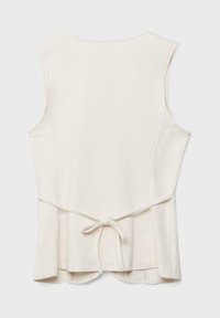 Bez rukávov krémová vesta s okrúhlym výstrihom a látkovou šnúrkou v zadnej časti pása pre nastaviteľné prispôsobenie.