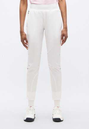 White athletic pants with a smooth texture, featuring a high waistband, side pockets, and reflective strip details along the seams.