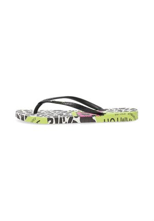 Chanclas coloridas con una correa de goma negra texturizada. La suela presenta un patrón gráfico en negro, blanco y verde neón con acentos en rosa.
