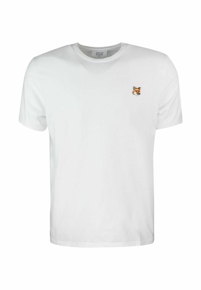 T-shirt bianco in cotone con scollatura a girocollo, presenta una testa di volpe ricamata in arancione e marrone sul lato sinistro del petto. Maniche corte.