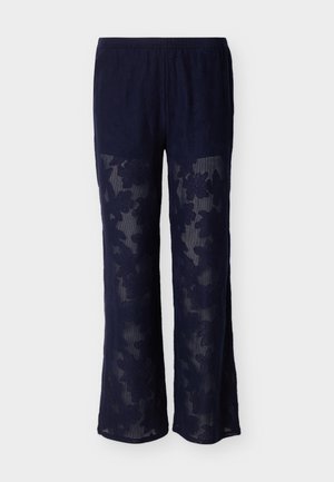 Pantalon large en voile bleu marine avec motif en dentelle florale et taille élastique.
