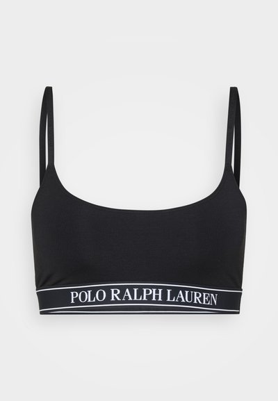 Μαύρη ριγέ βραζιλιάνικη κορυφή με ρυθμιζόμενες τιράντες και λευκή ταινία λογότυπου που γράφει "POLO RALPH LAUREN" κατά μήκος της κάτω άκρης.