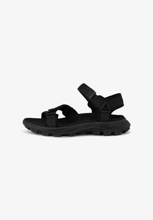 Svarta sportiga sandaler med justerbara remmar, strukturerad fotbädd, lätt design och slitstark gummiyttersula med greppmönster.