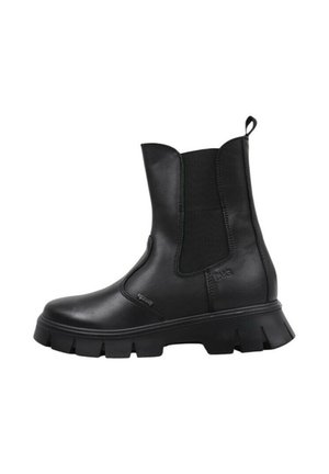 Bottes de cheville en cuir noir avec des panneaux élastiques latéraux, bout rond et semelle en caoutchouc épaisse. Équipées d'une languette à l'arrière pour un enfilage facile.