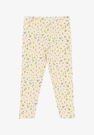 Šviesiai geltonos raštuotos leggingai su gumburu tekstūra, kuriuose yra mažų rožinių ir geltonų gėlių raštų bei elastinga juosmens juosta.