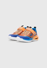 Children’s sporty sneakers with orange mesh, blue toe caps, adjustable straps, and white soles on a plain background.