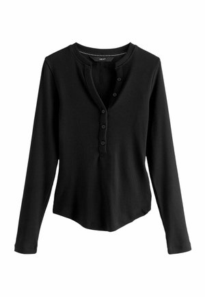 Zwarte lange mouw henley-top gemaakt van ribbed stof, met een ronde halslijn, een knoopsluiting en een licht gebogen zoom.