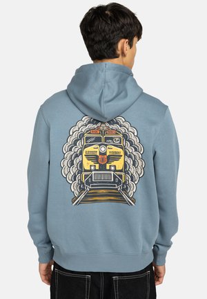 Hooded sweatshirt in light blue featuring a bold graphic of a yellow train amidst smoke on the back, with ribbed cuffs and hem.