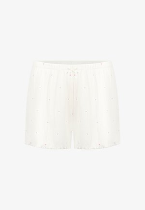 Witte korte broek met een gestructureerde stof en kleine roze hartjespatronen. Ze hebben een elastische tailleband en een trekkoorddetail.