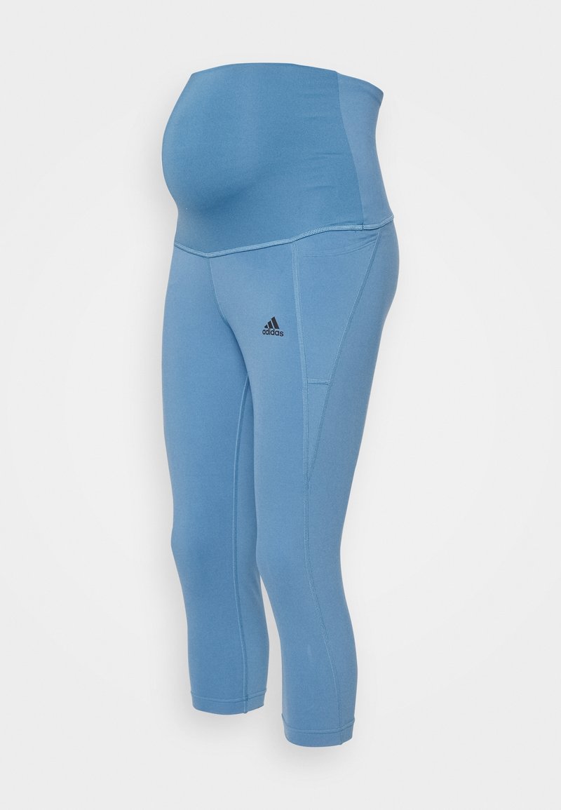 Blue maternity leggings with a high waistband and capri length. Made of moisture-wicking fabric, featuring an Adidas logo in black.