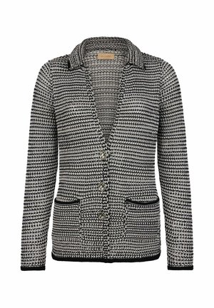 Cardigan a fantasia bianco e nero con colletto a punte, due tasche frontali, tre bottoni e tessuto a maglia testurizzato.
