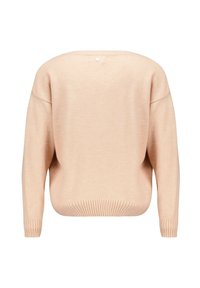 Pull surdimensionné rose pastel avec un grand col, des poignets et un ourlet côtelés, et un petit détail de bouton à l'arrière.