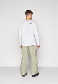 The North Face SLASHBACK PANT - Pantaloni de snowboard - clay grey/cavern grey
