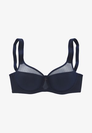 Tamno plavi grudnjak s žicom, mrežastim čašama i podešivim remenima. Ima suptilni točkasti uzorak i mali detalj učvršćenja na sredini.