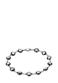 Pulsera en blanco y negro que presenta cuentas redondas con patrones circulares, unidas por una cadena metálica y aseguradas con un cierre de color plateado.