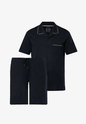 Marineblå bomulds natbuksa med korte ærmer, kontrastfarvet kant, knaplukning, brystlomme og shorts med snoretræk. Blød tekstur, afslappet pasform.