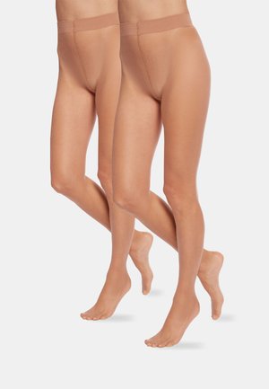 Nude sömlösa strumpbyxor med en mjuk yta, medelhög midja och förstärkt tå. Lämpliga för en mängd olika hudtoner.