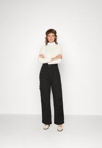 Replay PANTS - Calças cargo - black