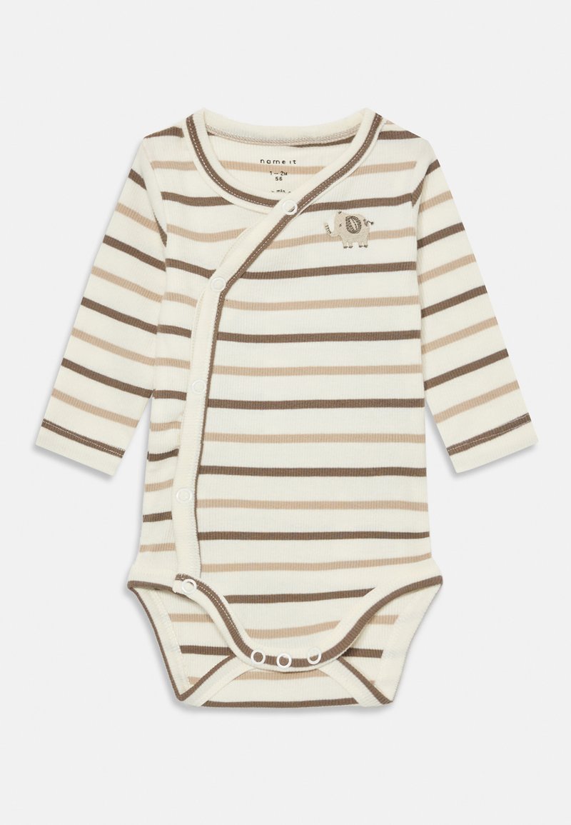 Stripete langermet body i kremfarge og brunt, med trykknapplukking og et lite elefantdesign foran. Myk, ribbet stoff.
