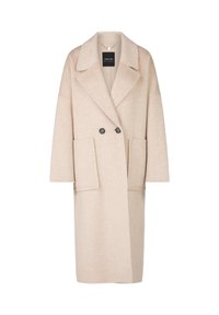 Beige wool blend coat with a double-breasted front, large patch pockets, shawl collar, and loose-fit sleeves. Matte black buttons add contrast.