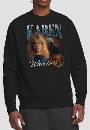 Black sweatshirt with collage of a woman labeled "Karen Wheeler" featuring three portrait-style images and scripted text.