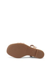 Suola di sandalo color tan con superficie testurizzata e a motivo. Presenta un design open-toe e una cinghia alla caviglia, realizzato in materiale liscio. Taglia 37.