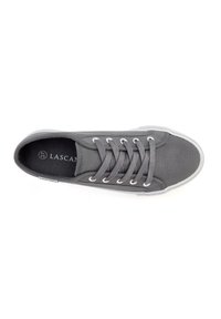 Gray canvas sneaker with round toe, six eyelets, white sole, and branding inside. Features a textured upper and flat laces.