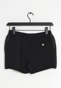 Pantaloni sportivi neri con un tessuto liscio, dotati di pannelli laterali testurizzati, una piccola tasca frontale e un accento in metallo sul bottone.