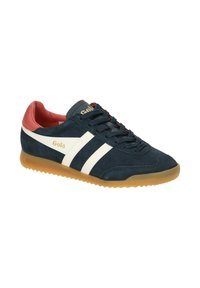 Navy suede sneaker with white stripes, red accents, and a gum rubber sole. Features a textured upper and round laces. Gola branding on the side.