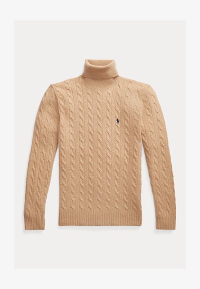 Bežna pletiva turtleneck pulover s ribanim robom na manžetah in spodnjem delu ter majhnim logotipom na levem prsnem delu. Mehka tekstura.