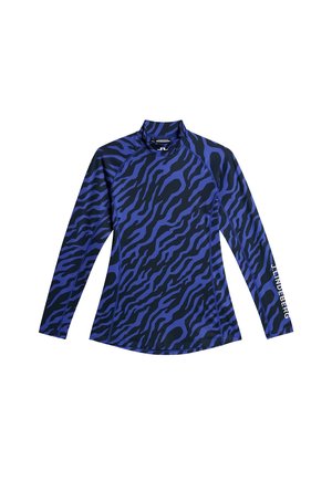 Blue long-sleeve shirt featuring a black and dark blue tiger stripe pattern, a high collar, and white logo text on the sleeve.