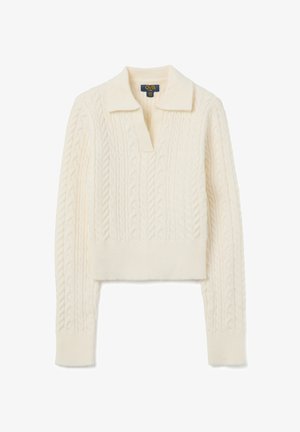 Cream-colored cropped sweater with a V-neck collar. Features a cable knit pattern throughout, ribbed cuffs, and hem. Soft texture.