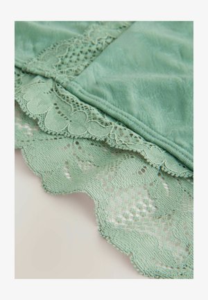 Mint green fabric with delicate lace trim featuring a scalloped edge and intricate floral patterns, blending texture and softness.