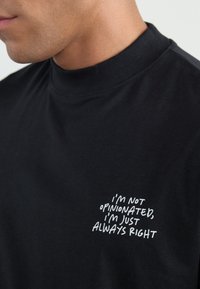 YOURTURN UNISEX - Tops ar garām piedurknēm - black