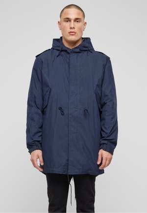 Marinblå huva parka-jacka med dragsnöre, med långa ärmar, toggelstängningar och en avslappnad passform, tillverkad av lättviktsmaterial.