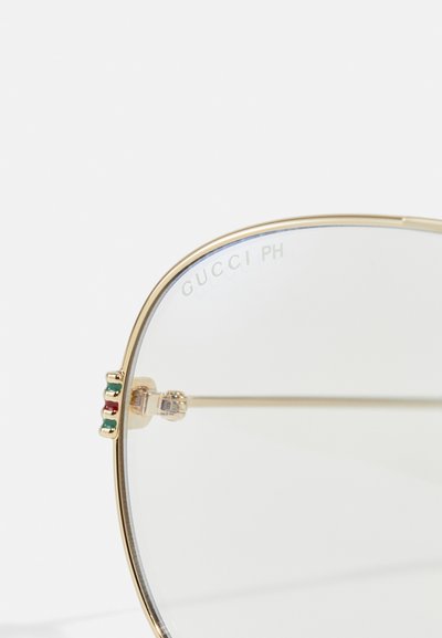 Gucci Sončna očala - gold