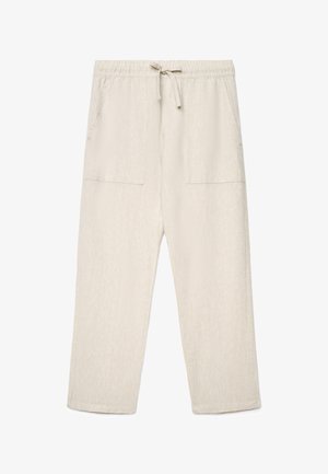 Leicht beigefarbene Freizeithose mit elastischem Bund, Kordelzug, weiten Beinen und großen rechteckigen Fronttaschen.