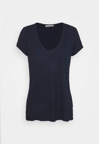 Navy blue short-sleeve T-shirt with a deep V-neck, made of soft, textured fabric, featuring a relaxed fit and a hemline that falls at the hips.