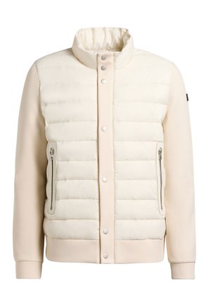 Cremefarbene Steppjacke mit Druckknöpfen vorne und Reißverschlusstaschen an den Seiten, mit hohem Kragen und langen Ärmeln.